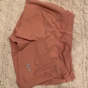 Blush women’s Nike running shorts